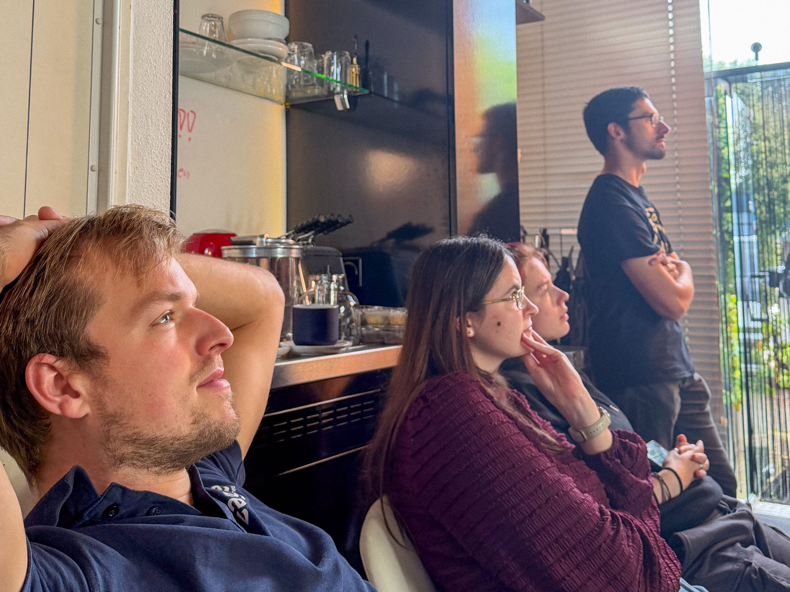 The Easysee team gathered to watch the live demonstrations of custom tools during the final showcase.